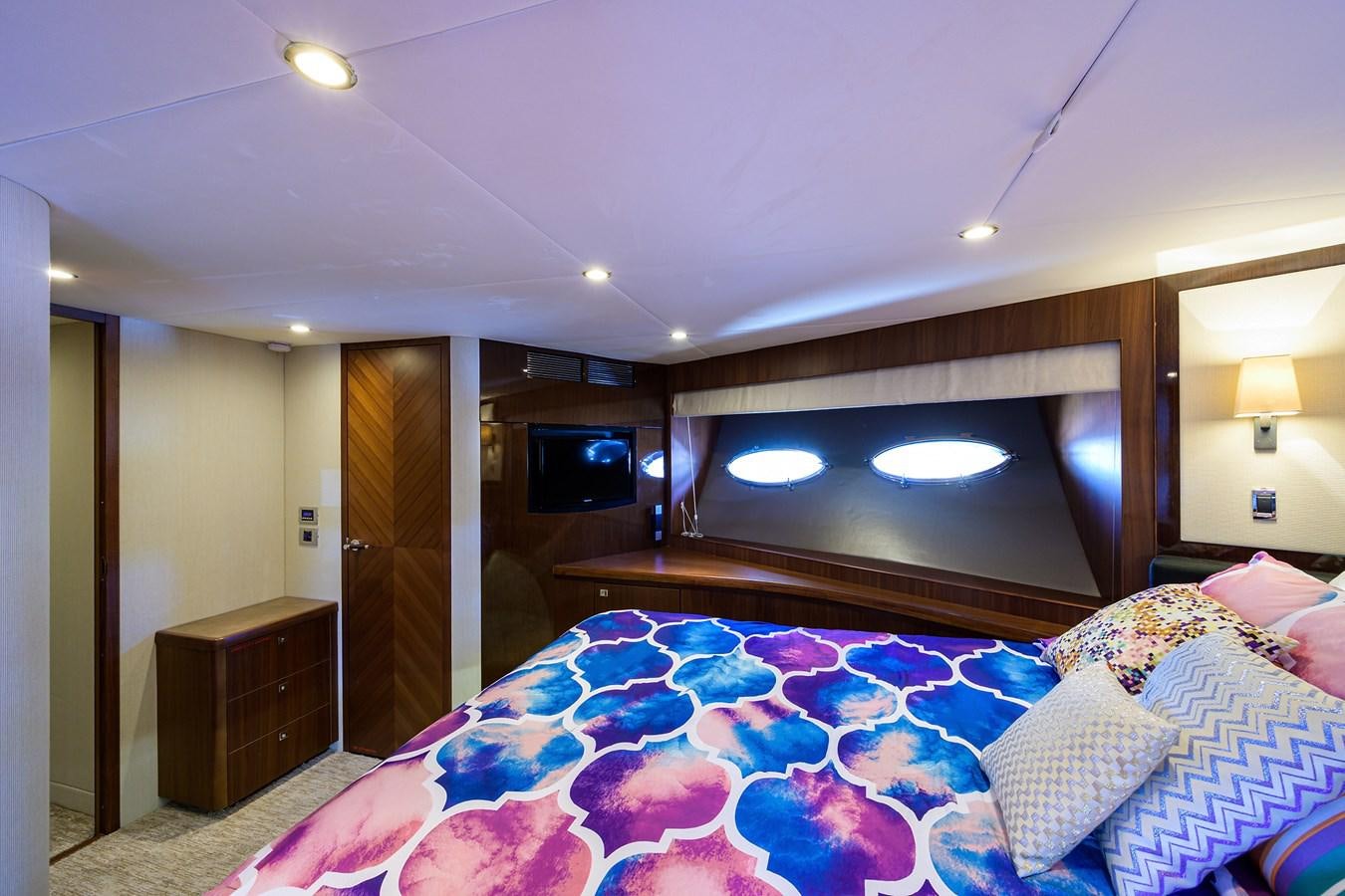 a bedroom with a large bed aboard FREUDIAN SLIP Yacht for Sale