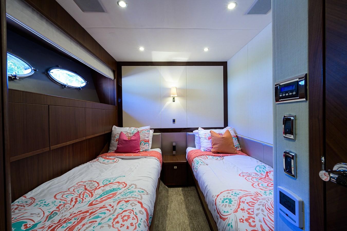 a room with two beds aboard FREUDIAN SLIP Yacht for Sale
