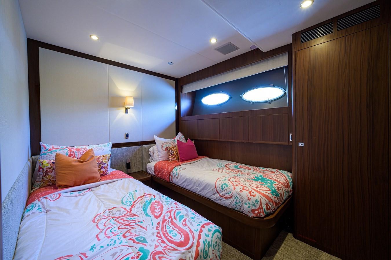 a couple of beds in a hotel room aboard FREUDIAN SLIP Yacht for Sale