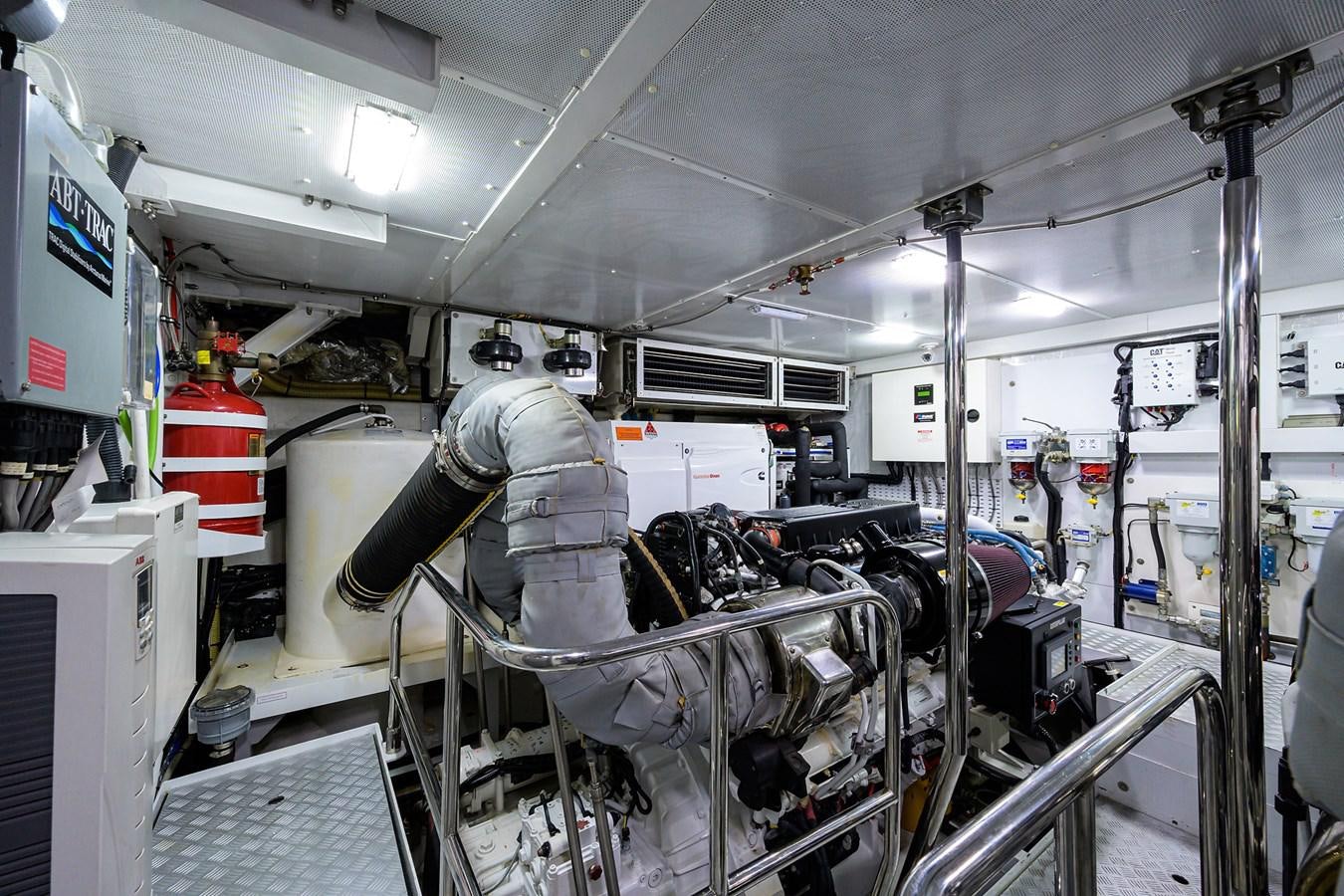 a person in a space suit working on a machine aboard FREUDIAN SLIP Yacht for Sale