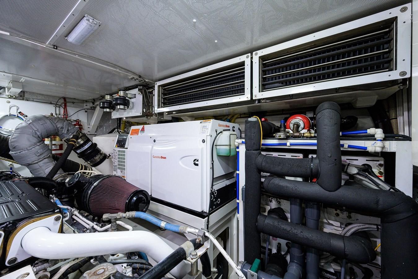 a car with a large engine aboard FREUDIAN SLIP Yacht for Sale