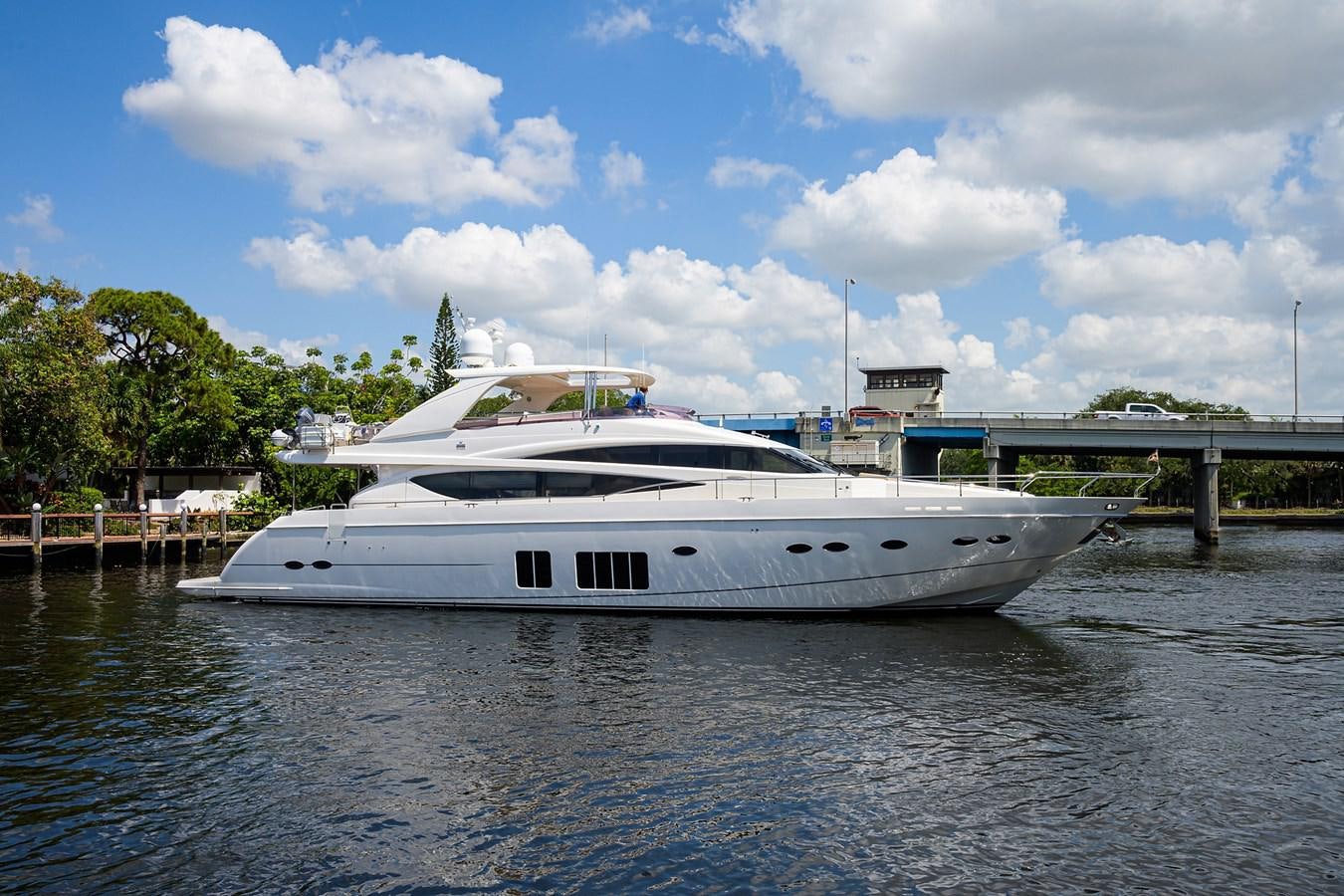 a white yacht on the water aboard FREUDIAN SLIP Yacht for Sale