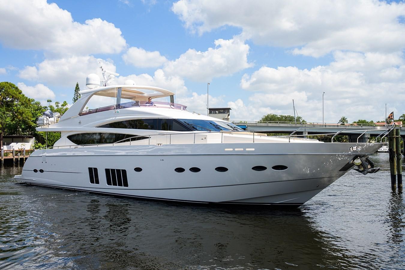 a white yacht docked aboard FREUDIAN SLIP Yacht for Sale