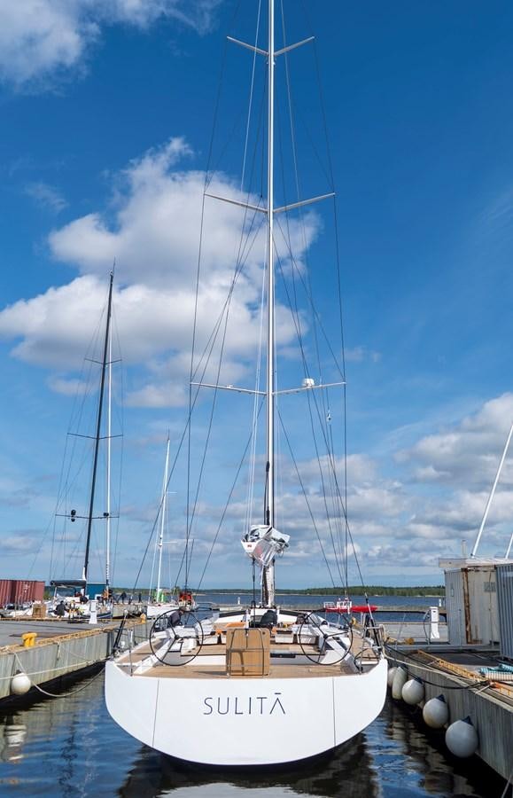 a boat docked at a pier aboard SULITA Yacht for Sale
