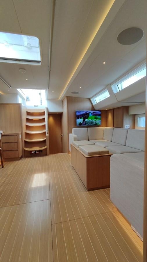 a room with a bed and a couch aboard SULITA Yacht for Sale