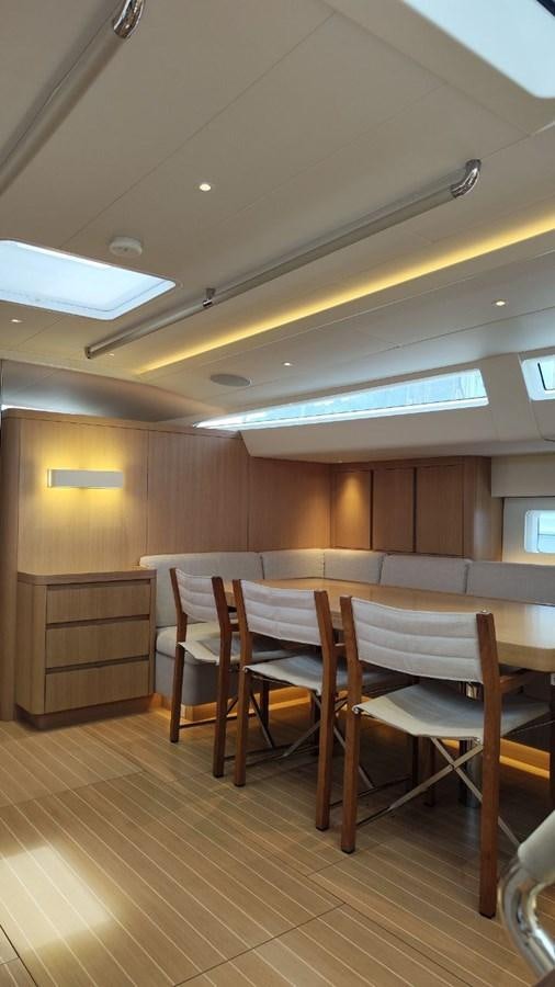 a room with a table and chairs aboard SULITA Yacht for Sale
