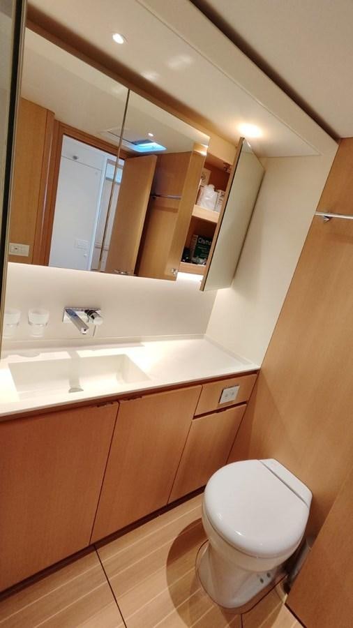a bathroom with a toilet and a sink aboard SULITA Yacht for Sale