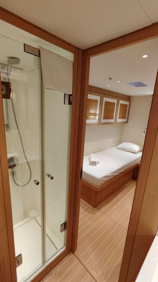 a bathroom with a glass shower aboard SULITA Yacht for Sale