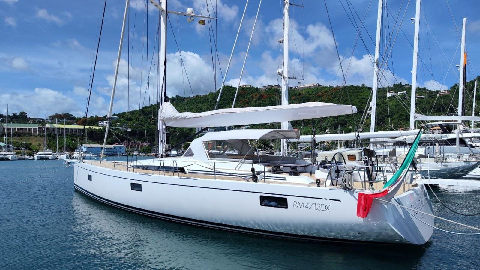 a white boat in the water aboard SULITA Yacht for Sale