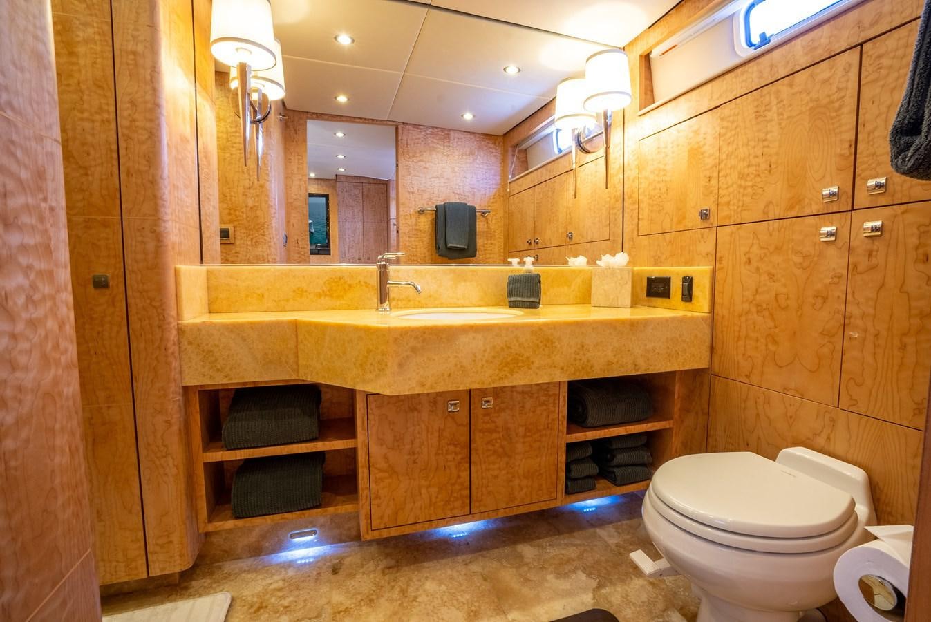 a bathroom with a sink and toilet aboard GATO BLANCO Yacht for Sale