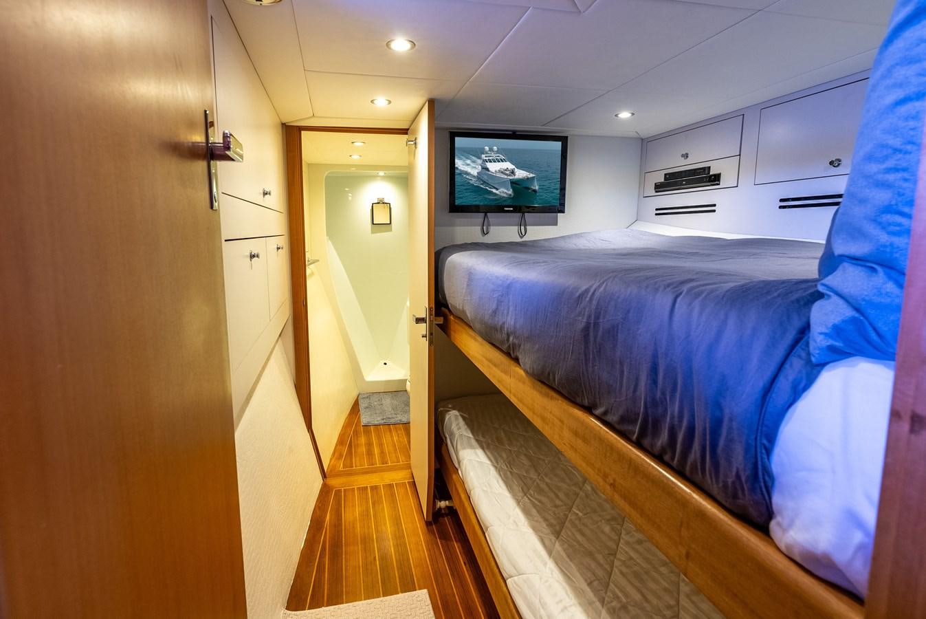 a bed in a room aboard GATO BLANCO Yacht for Sale
