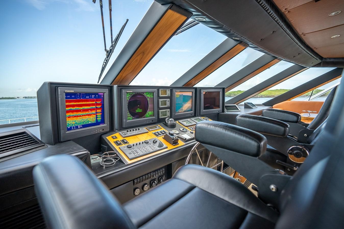 a car with monitors and screens aboard GATO BLANCO Yacht for Sale