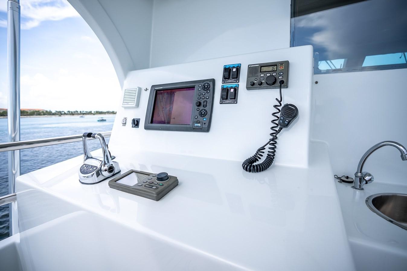 a sink with a television on it aboard GATO BLANCO Yacht for Sale
