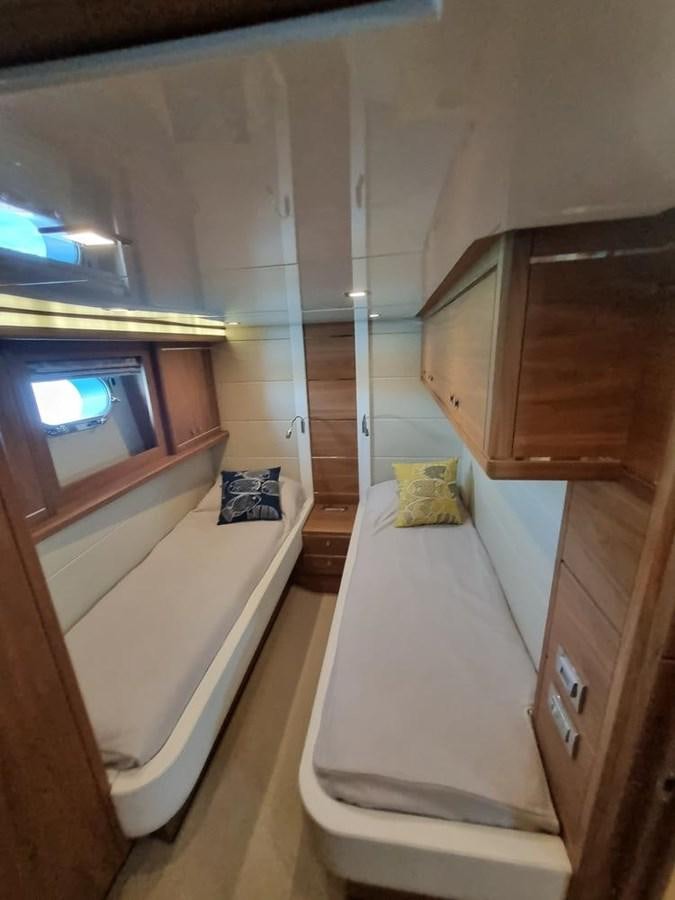 a bathroom with a tub and a sink aboard PLEIADES Yacht for Sale
