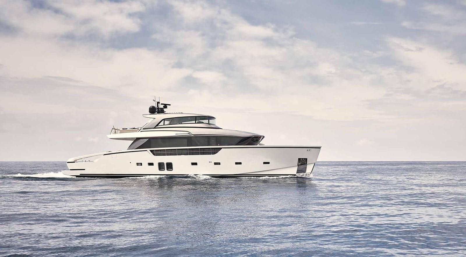 a white yacht in the water aboard OMNIA Yacht for Sale