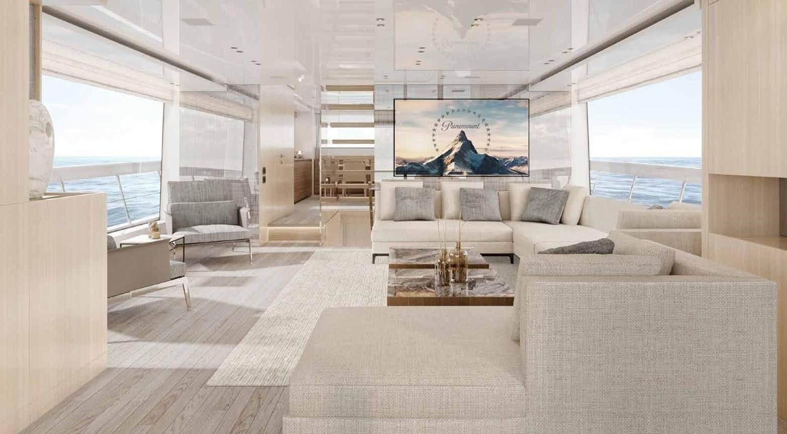 a living room with white furniture aboard OMNIA Yacht for Sale