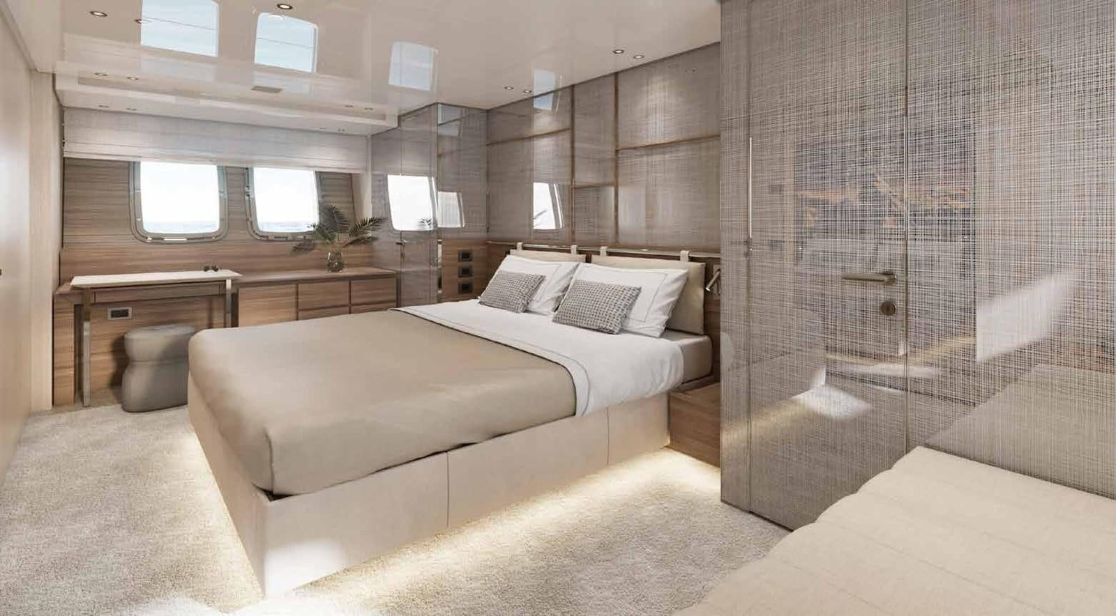 a room with a bed and a desk aboard OMNIA Yacht for Sale