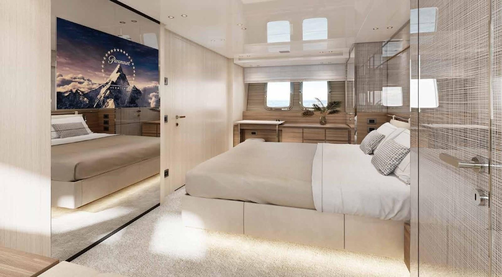 a room with a bed and a couch aboard OMNIA Yacht for Sale