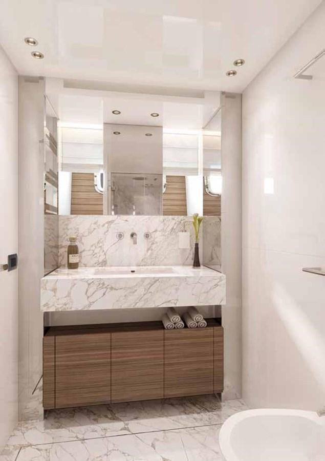 a bathroom with a large mirror aboard OMNIA Yacht for Sale