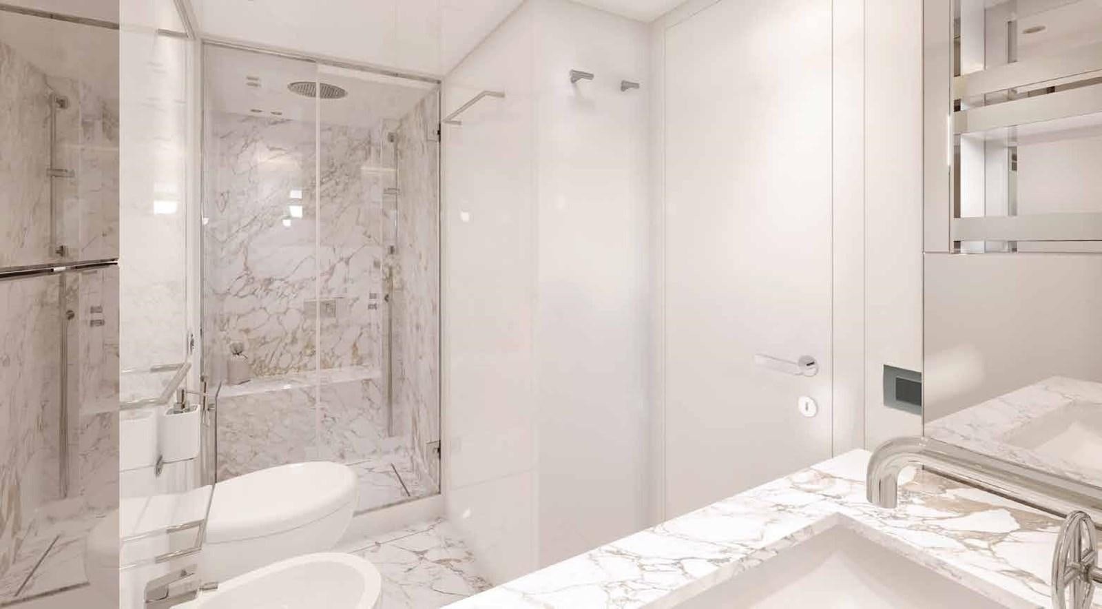 a bathroom with a shower and sink aboard OMNIA Yacht for Sale