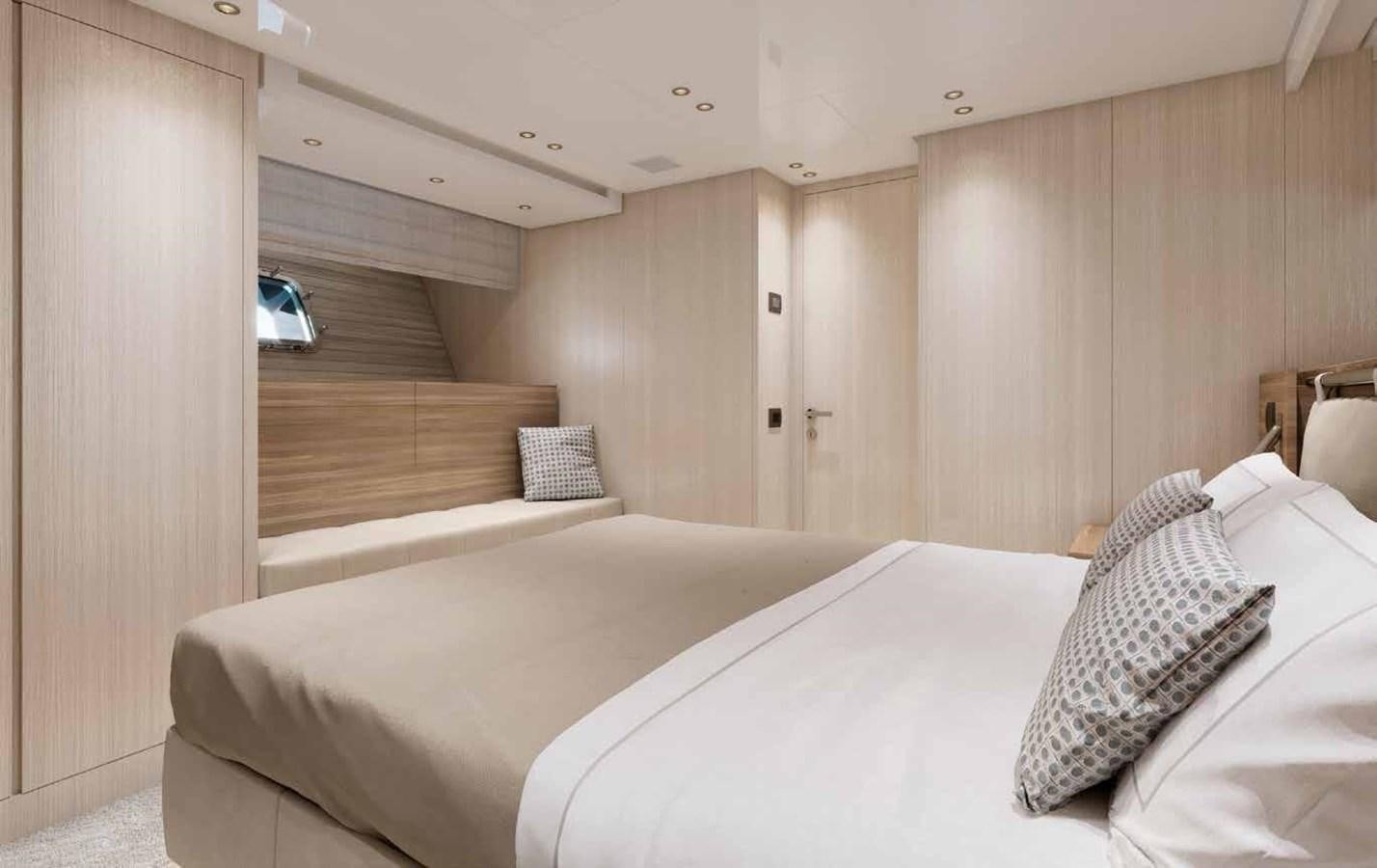 a room with a bed and a wood wall aboard OMNIA Yacht for Sale
