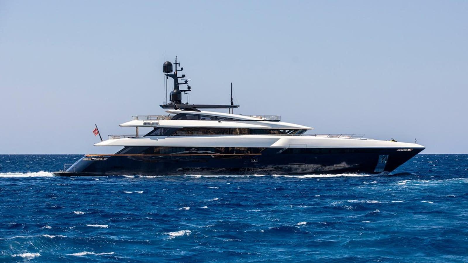 a large ship in the water aboard N2H Yacht for Sale