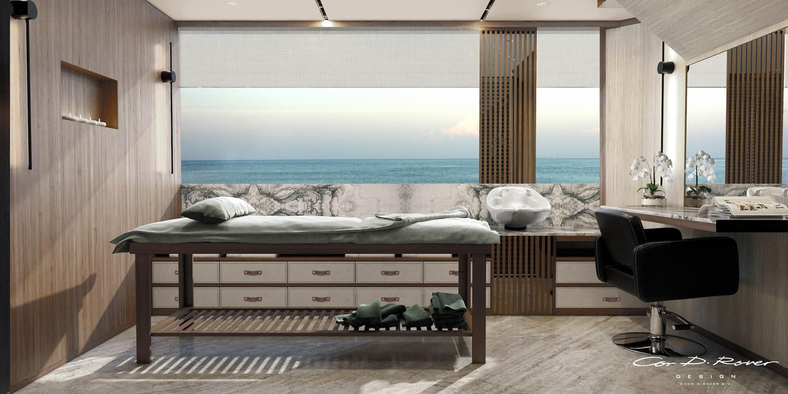 a room with a bed and a chair aboard HORIZON Yacht for Sale