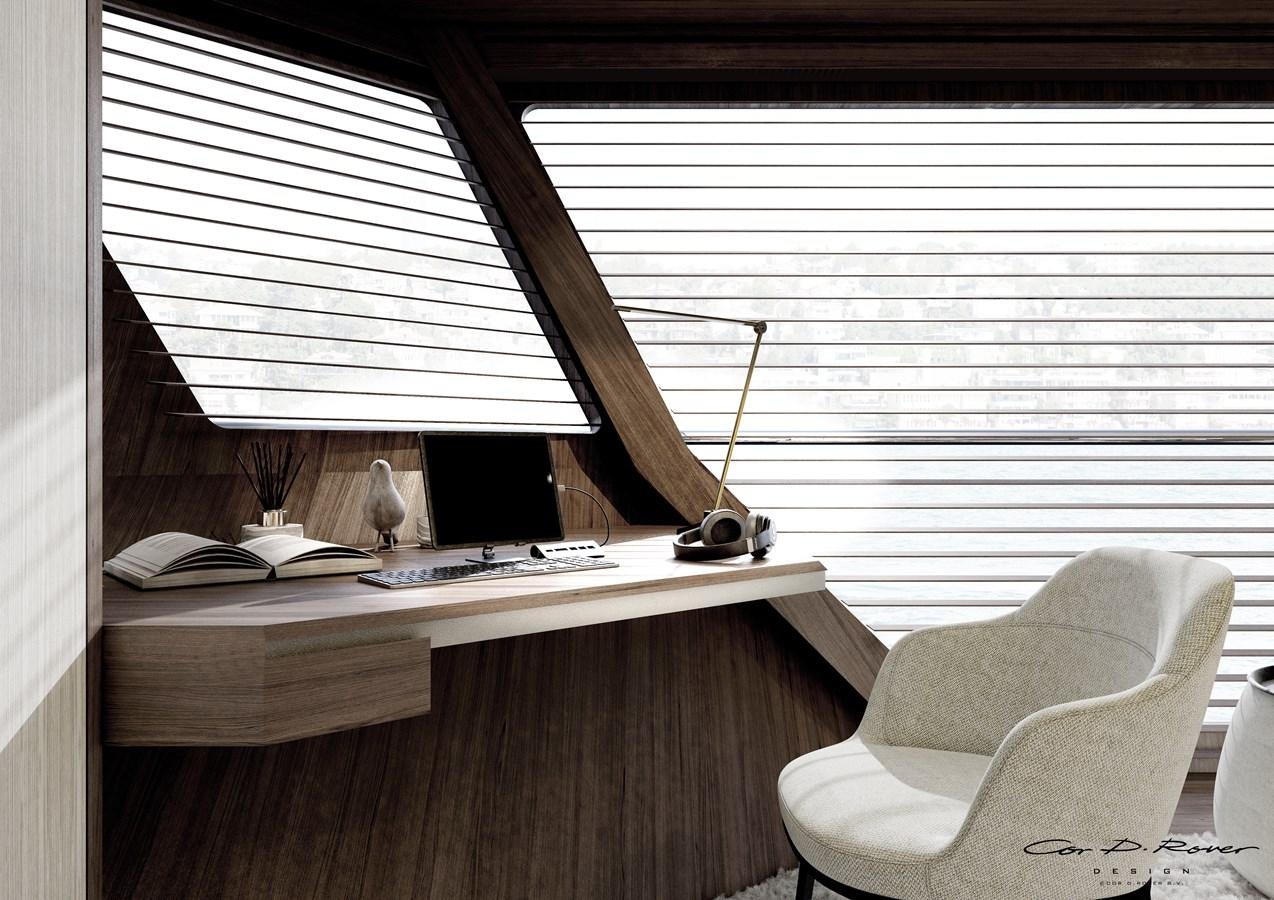 a desk with a computer and a chair aboard HORIZON Yacht for Sale