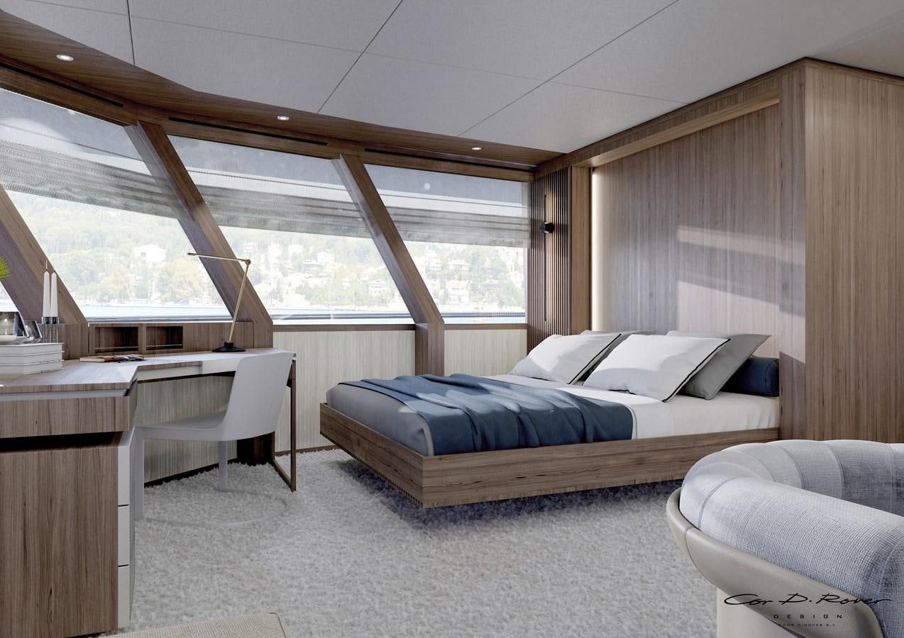 a room with a bed and a desk aboard HORIZON Yacht for Sale