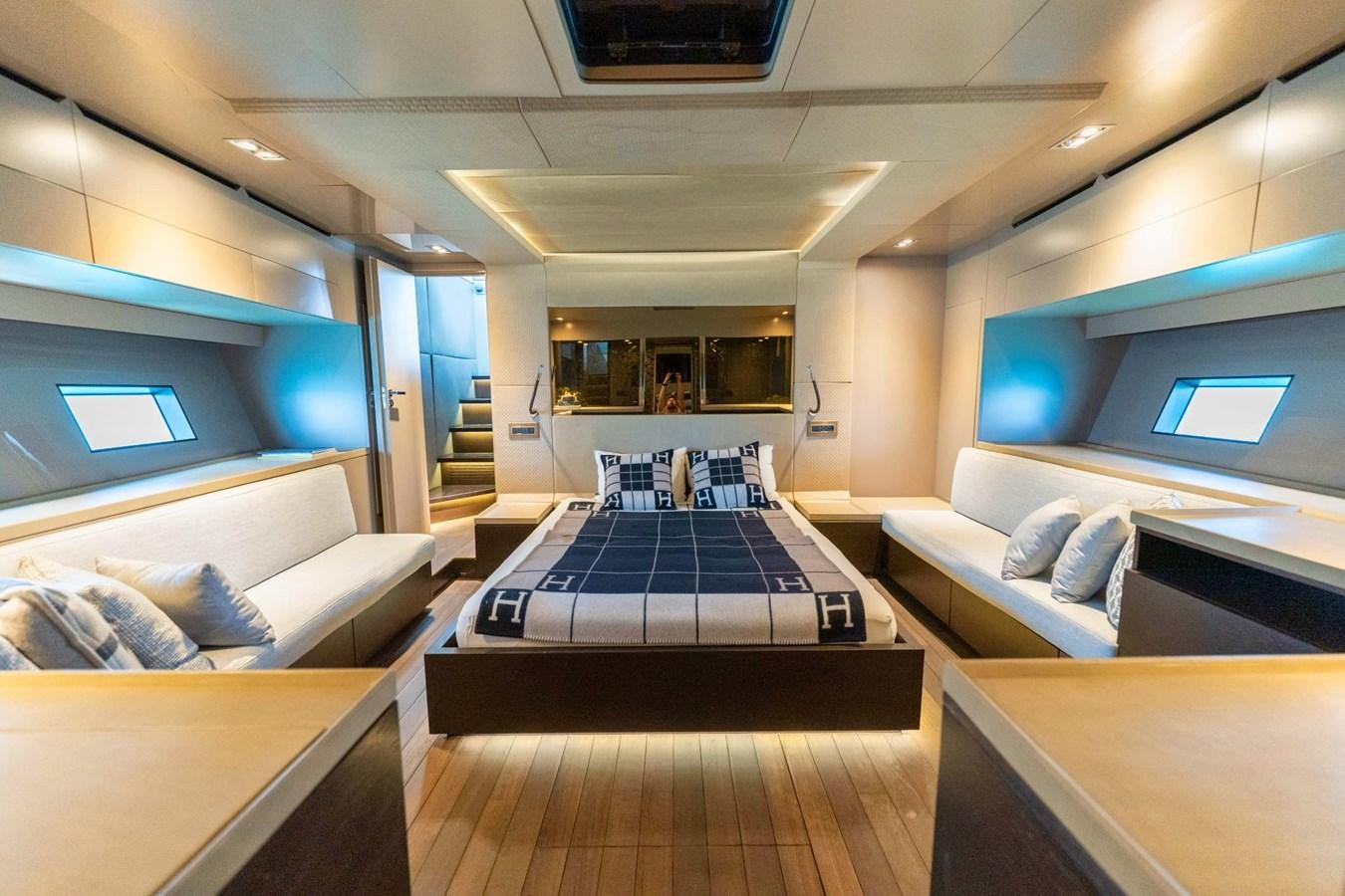 a room with a couch and a table aboard FINEZZA Yacht for Sale