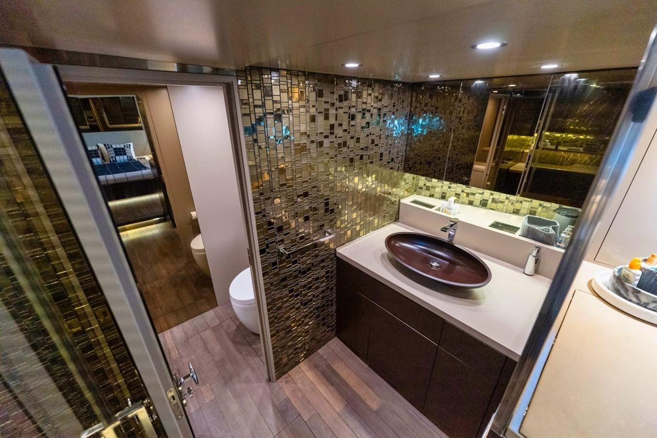 a bathroom with a large glass shower aboard FINEZZA Yacht for Sale