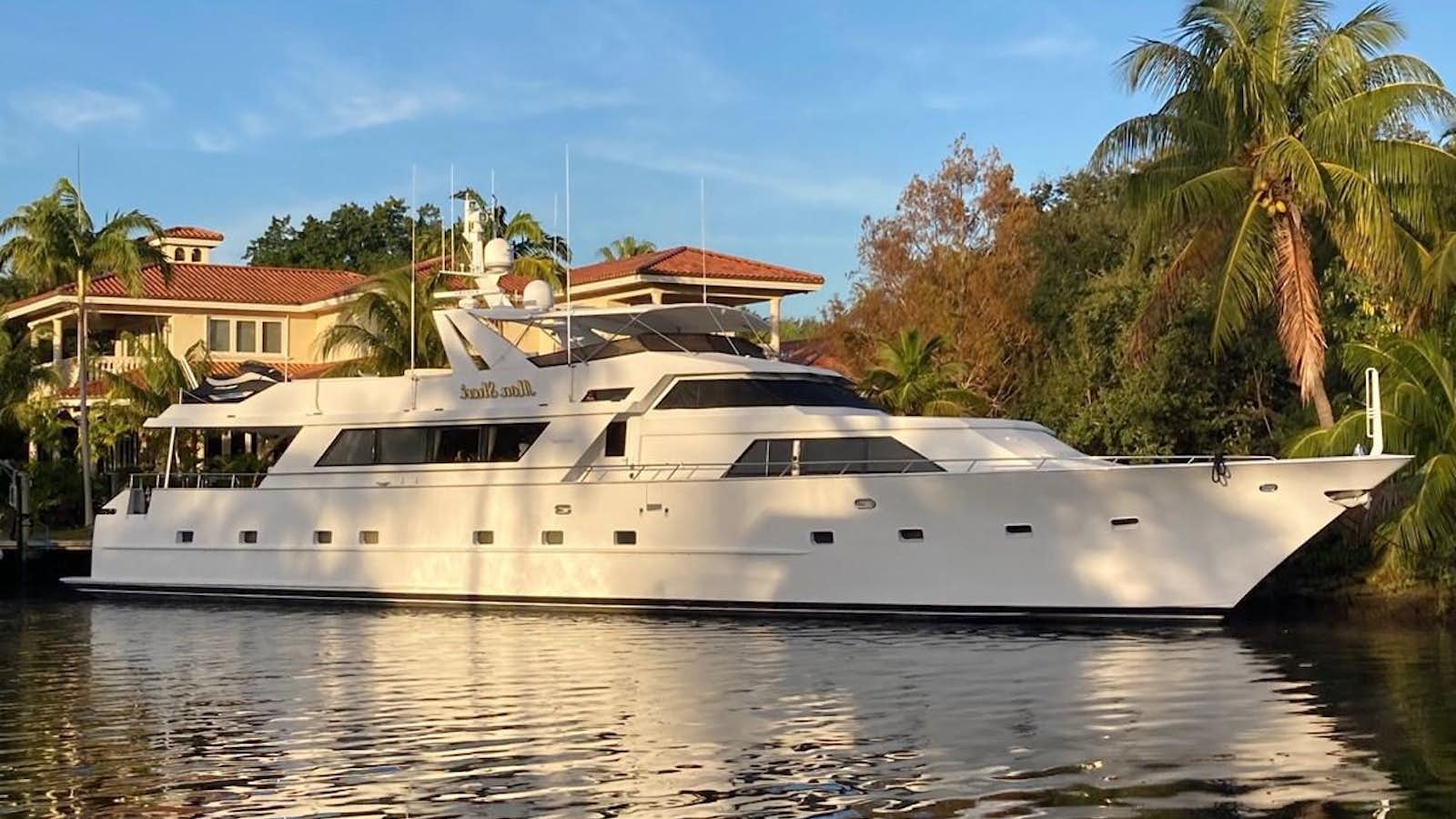 a white yacht on the water aboard MON SHERI Yacht for Sale