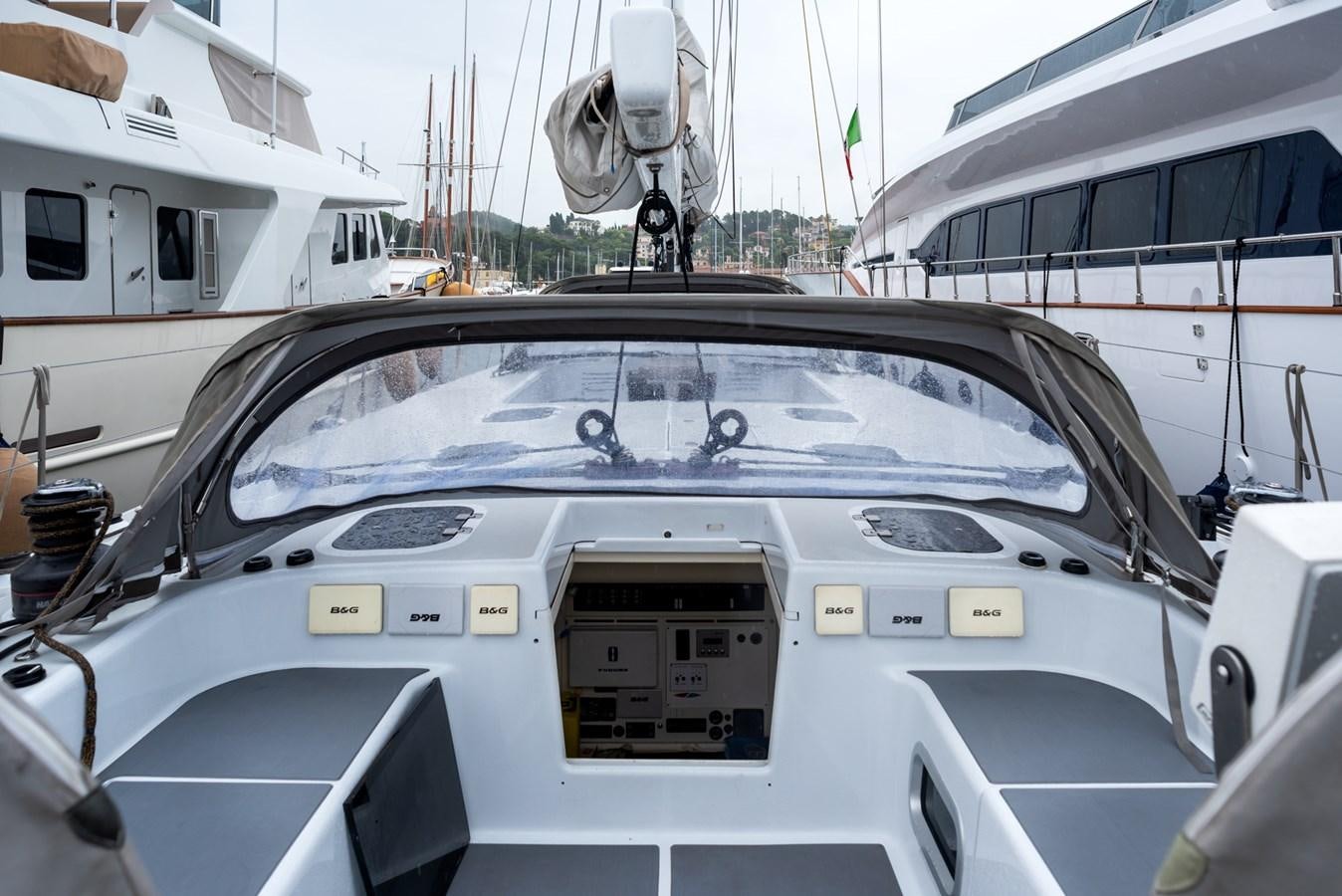 a white car parked in a parking lot aboard MISTER A Yacht for Sale