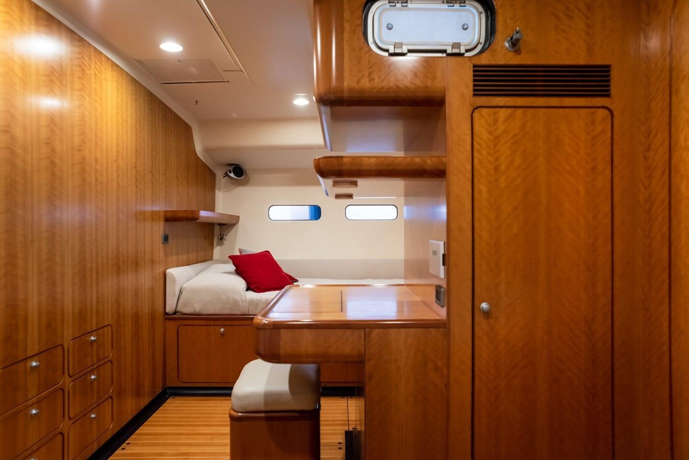 a bathroom with a sink and a bed aboard MISTER A Yacht for Sale