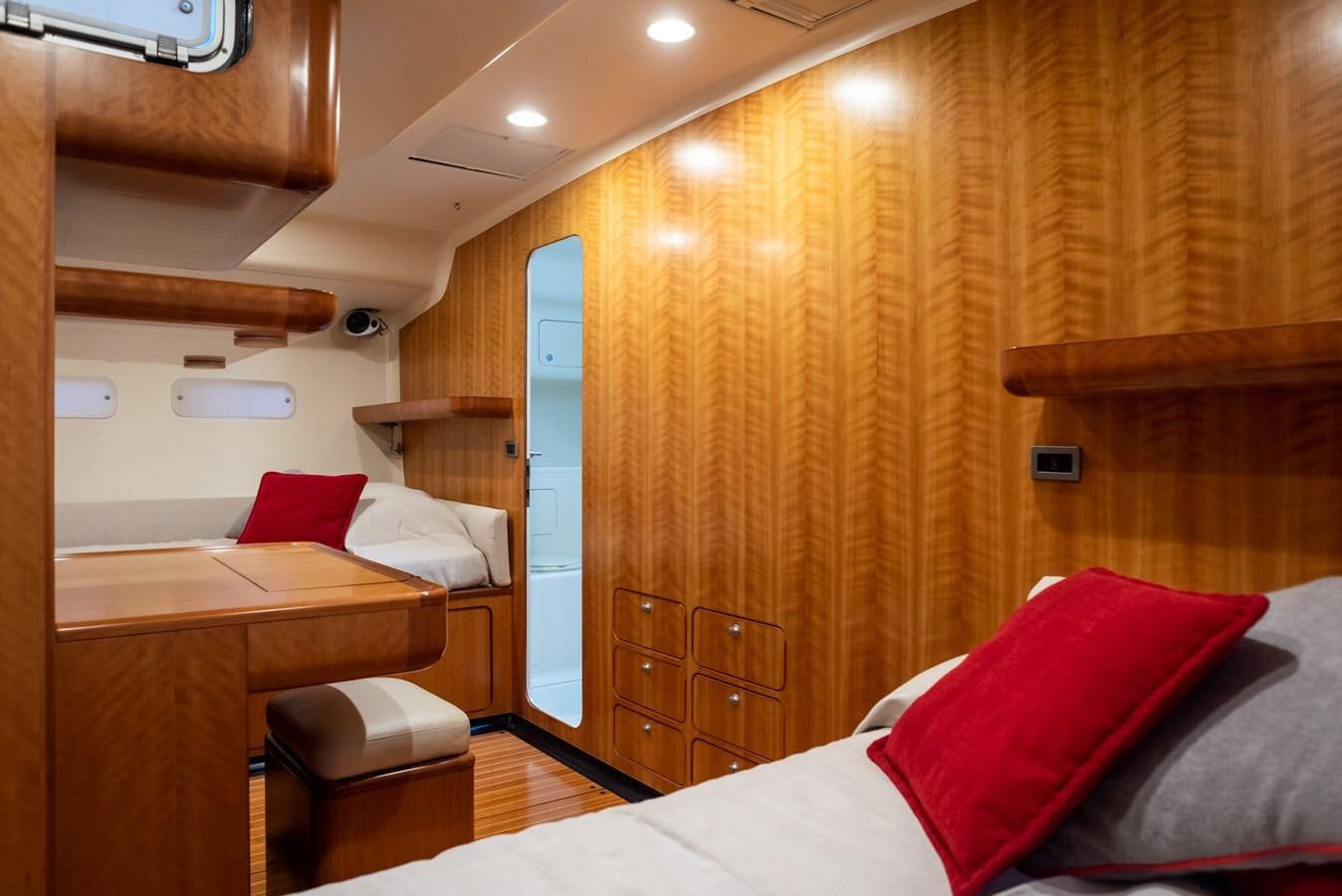 a room with a bed and a desk aboard MISTER A Yacht for Sale
