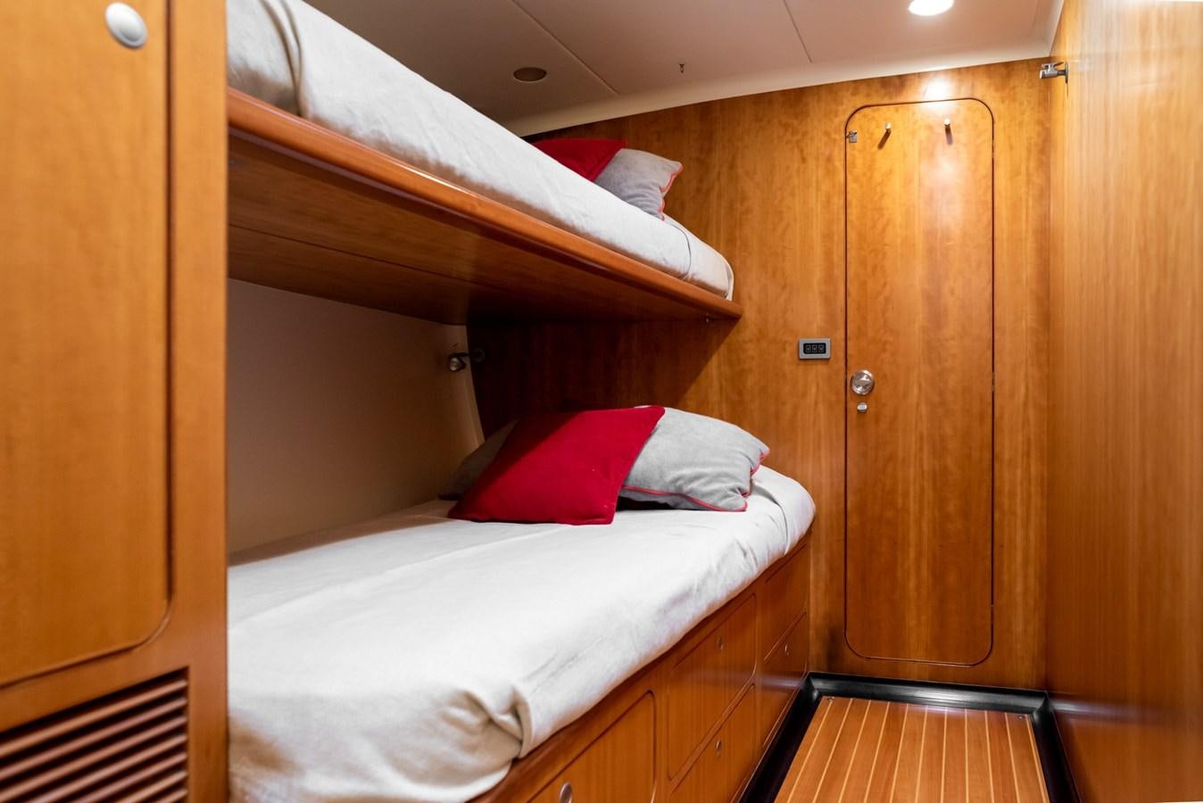 a bed in a room aboard MISTER A Yacht for Sale
