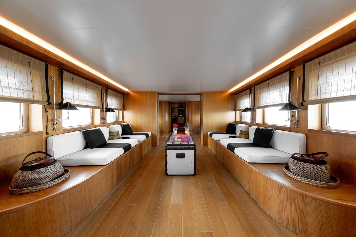 a room with a bed and a couch aboard SOUNION II Yacht for Sale