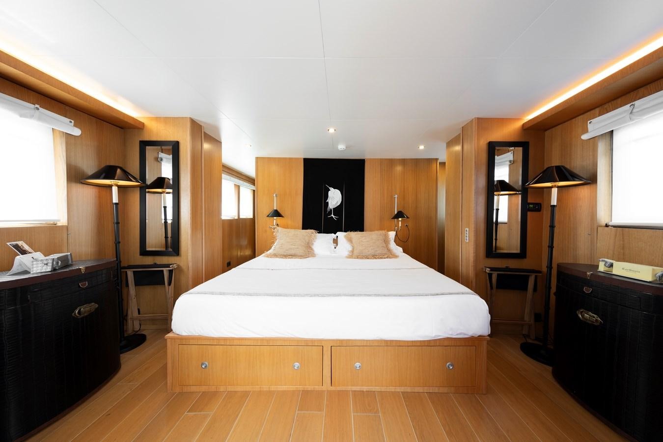 a large bed in a hotel room aboard SOUNION II Yacht for Sale