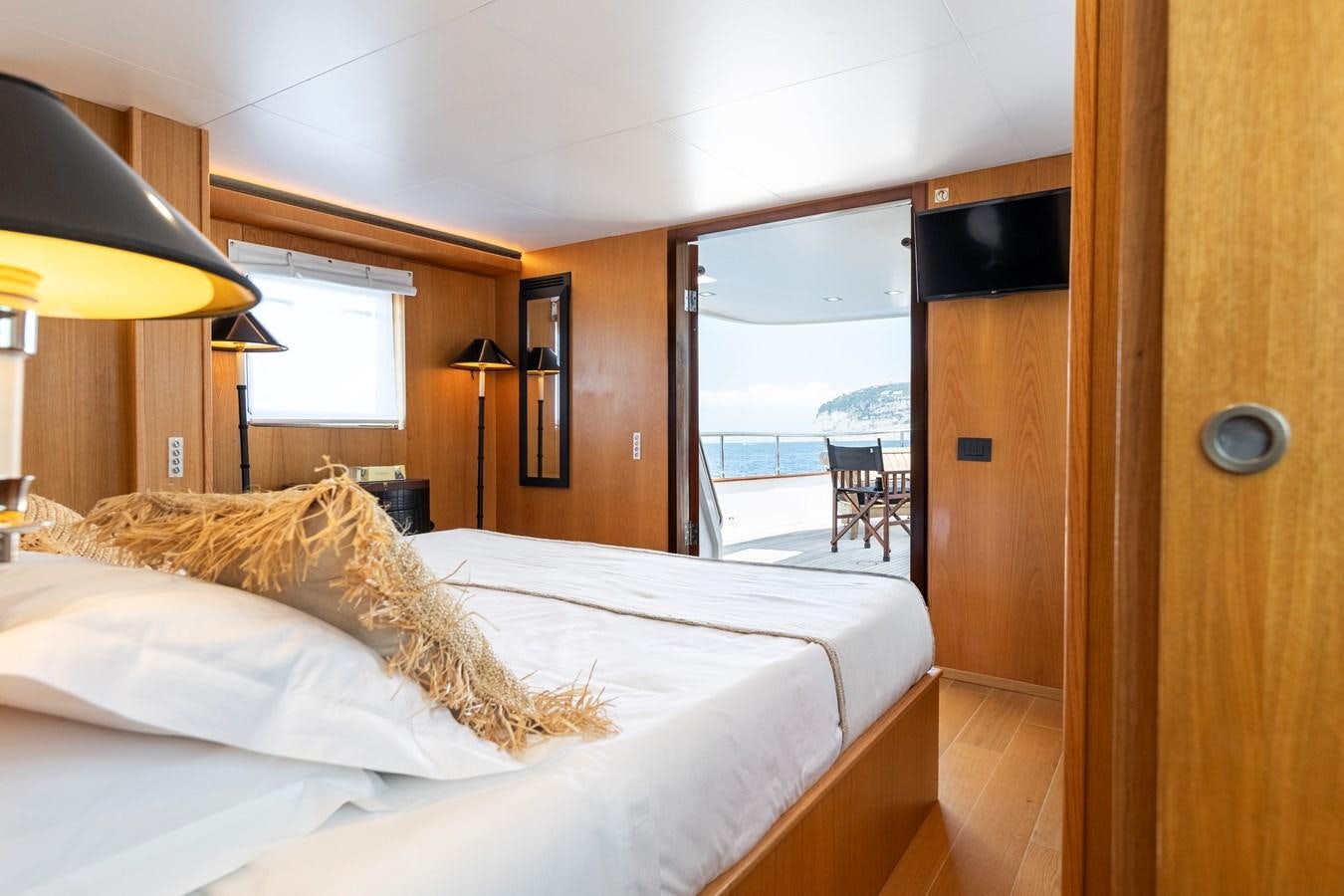 a bed in a room aboard SOUNION II Yacht for Sale