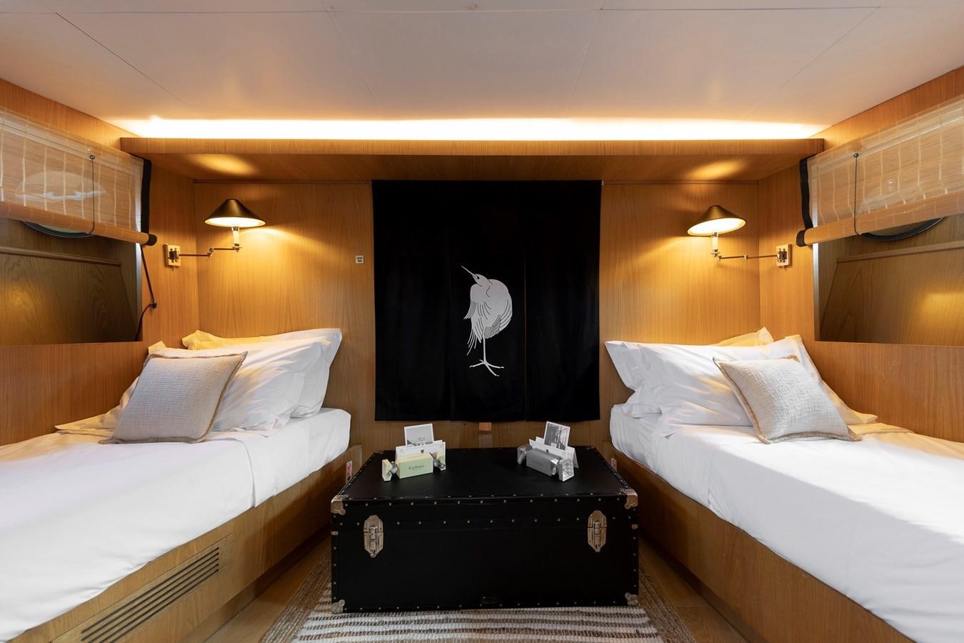 a room with two beds aboard SOUNION II Yacht for Sale