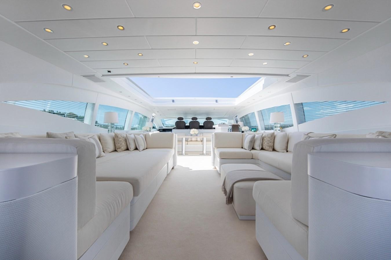 a room with a couch and a table aboard DAYBOAT Yacht for Sale
