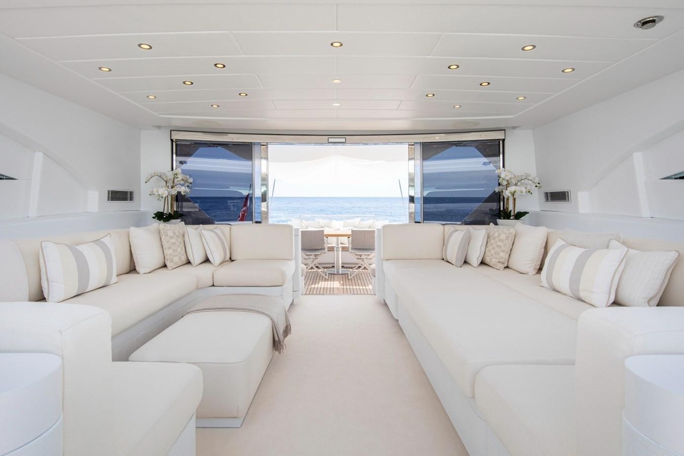 a living room with a large window aboard DAYBOAT Yacht for Sale