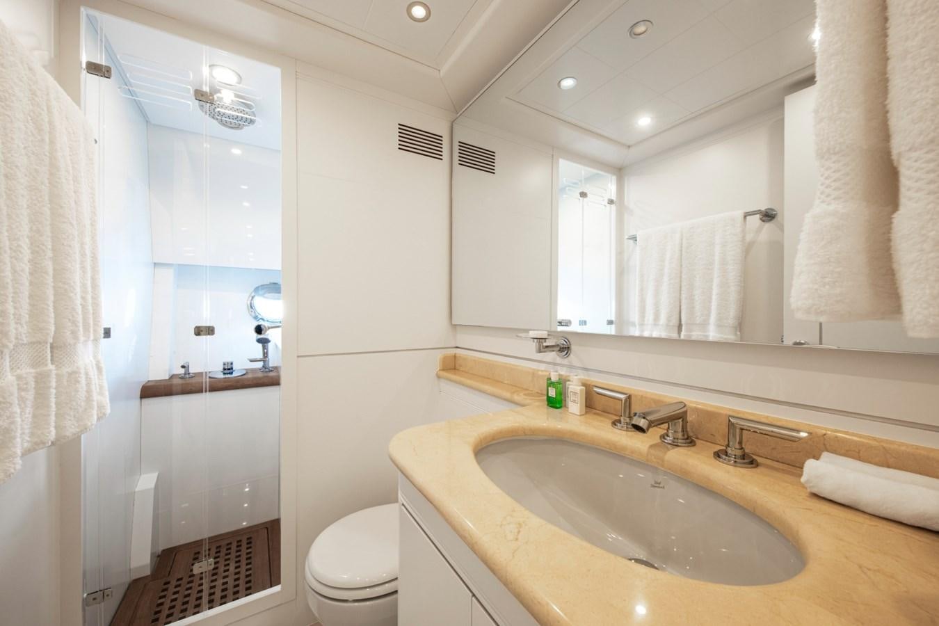 a bathroom with a sink and toilet aboard DAYBOAT Yacht for Sale