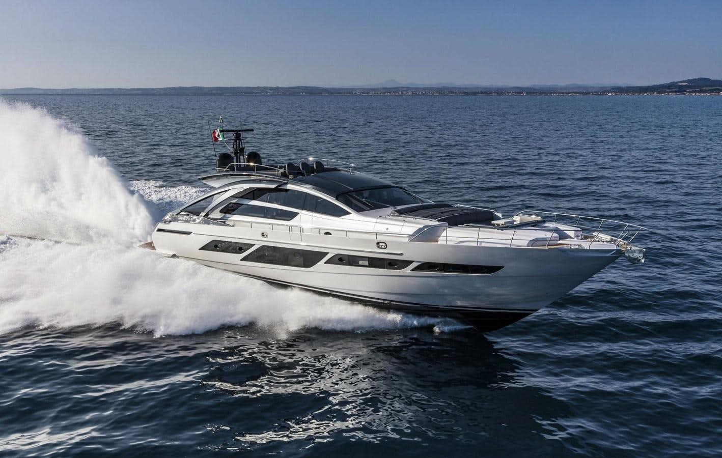 a white yacht on the water aboard PERSHING 9X/26 Yacht for Sale