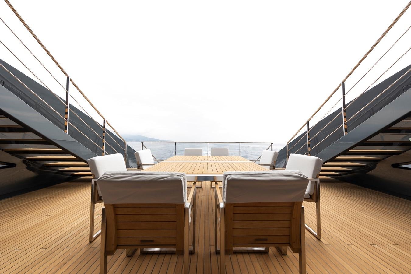 a deck with a bed and a railing aboard OCEAN PEARL - FRACTIONAL OWNERSHIP VESSEL Yacht for Sale