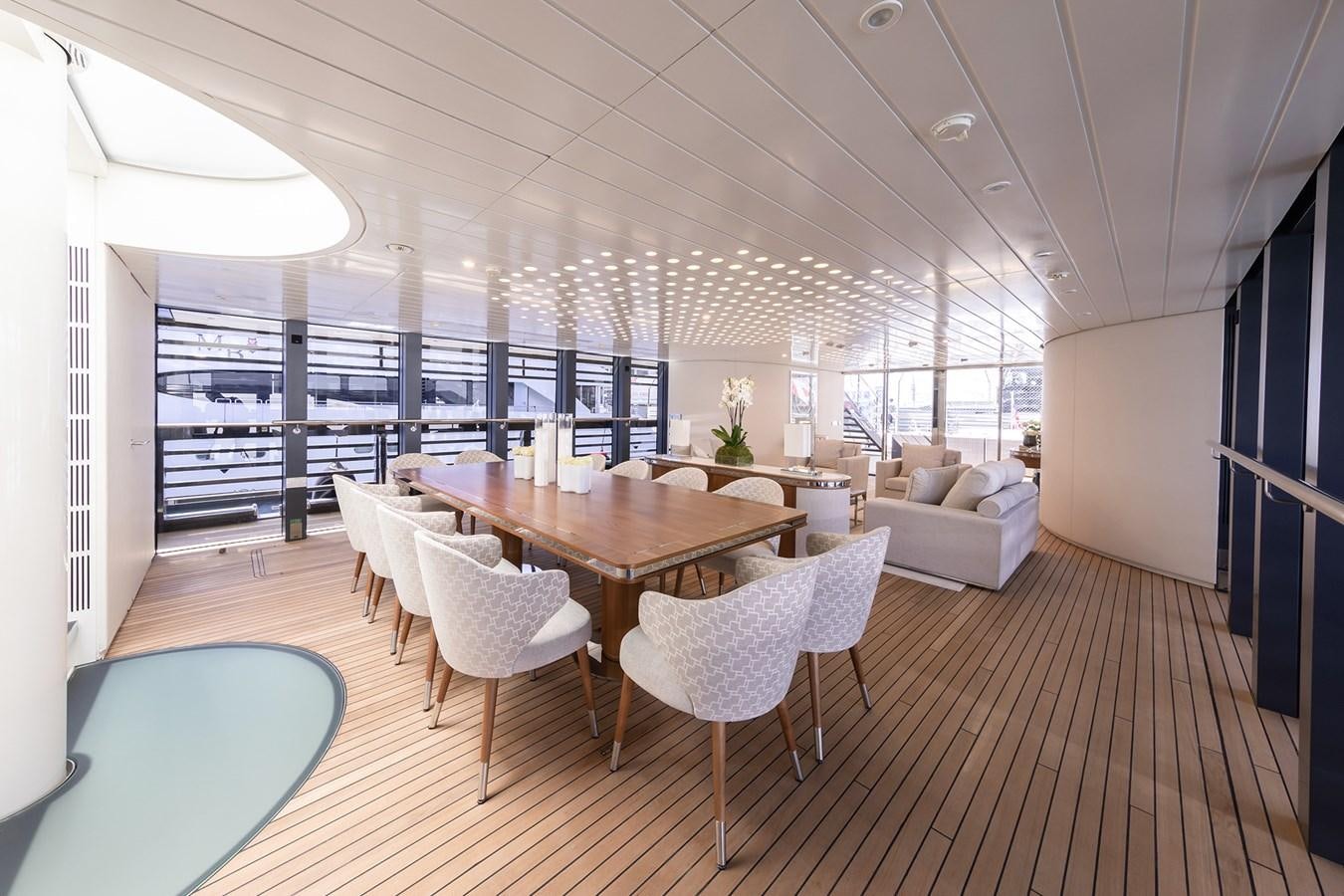 a large dining table in a room aboard OCEAN PEARL - FRACTIONAL OWNERSHIP VESSEL Yacht for Sale