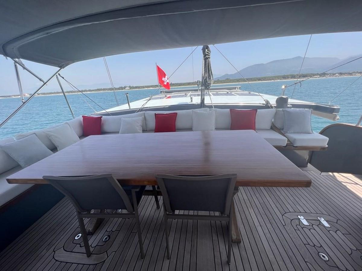 a large white boat on a deck aboard AYO Yacht for Sale