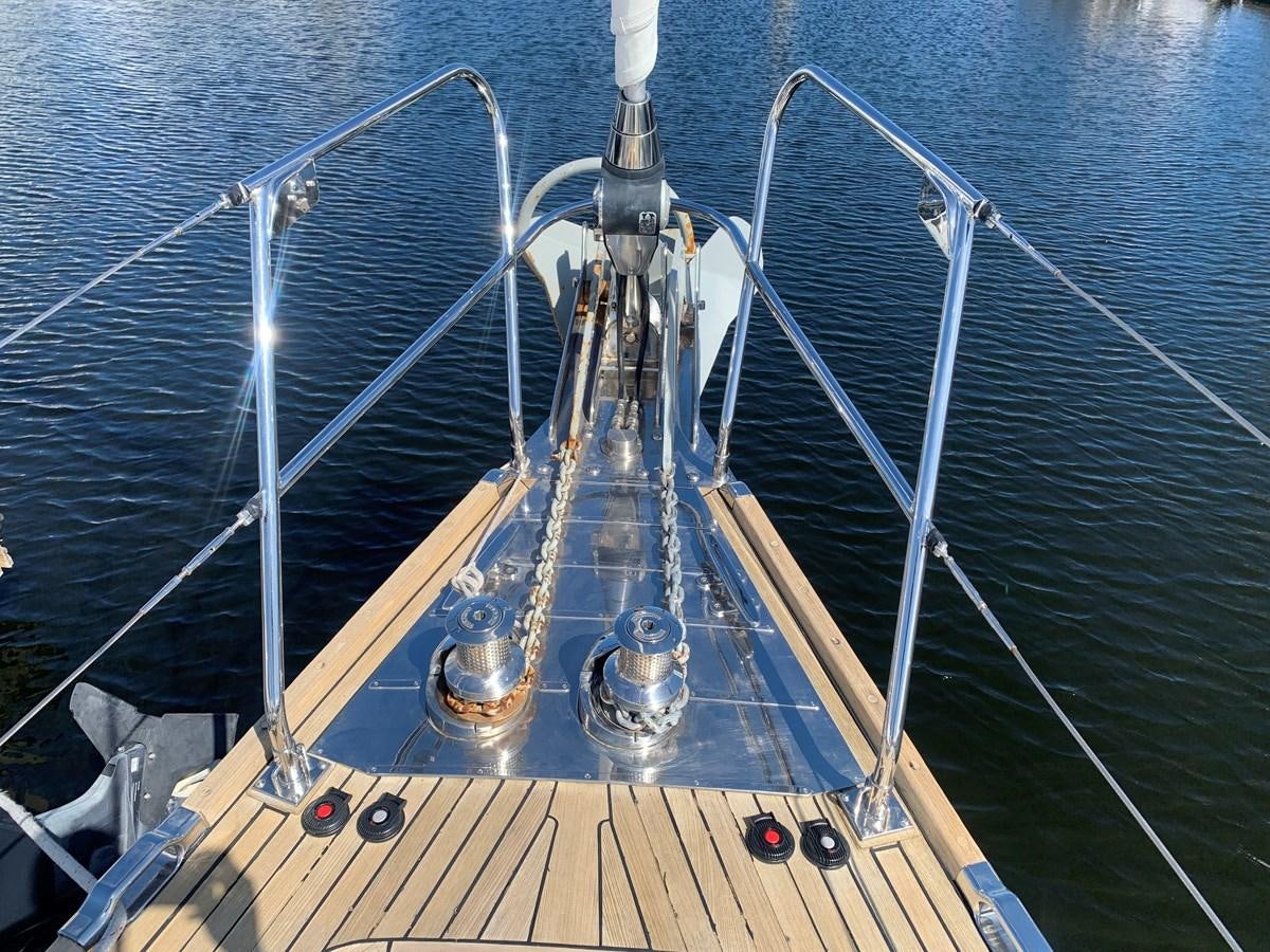 a ship with a large ship in the water aboard LUCKY B Yacht for Sale