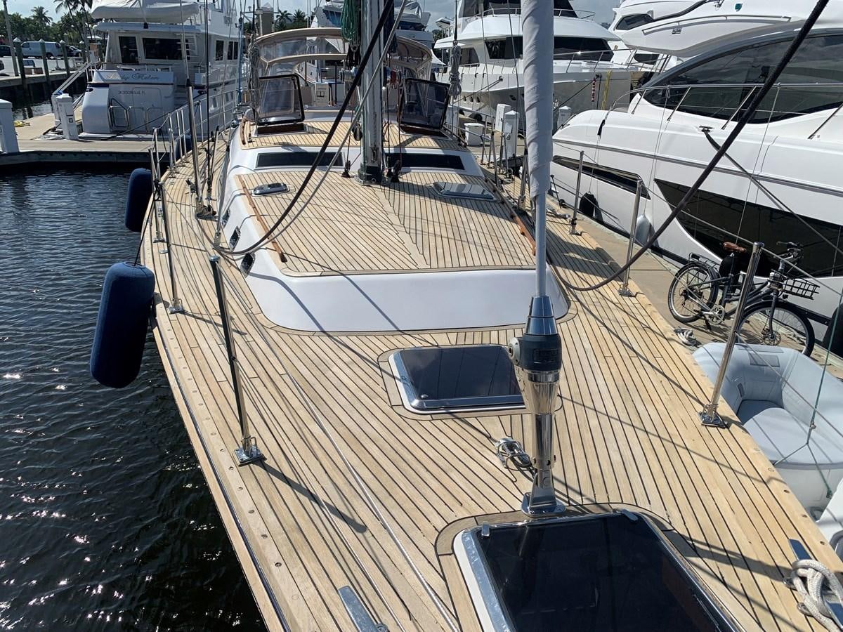 a boat is parked on the dock aboard LUCKY B Yacht for Sale