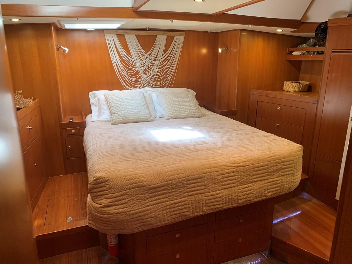 a bed in a cabin aboard LUCKY B Yacht for Sale